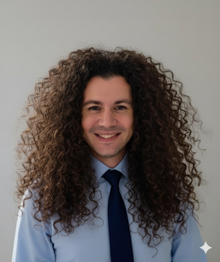 CEO: A man with long hair and curls.